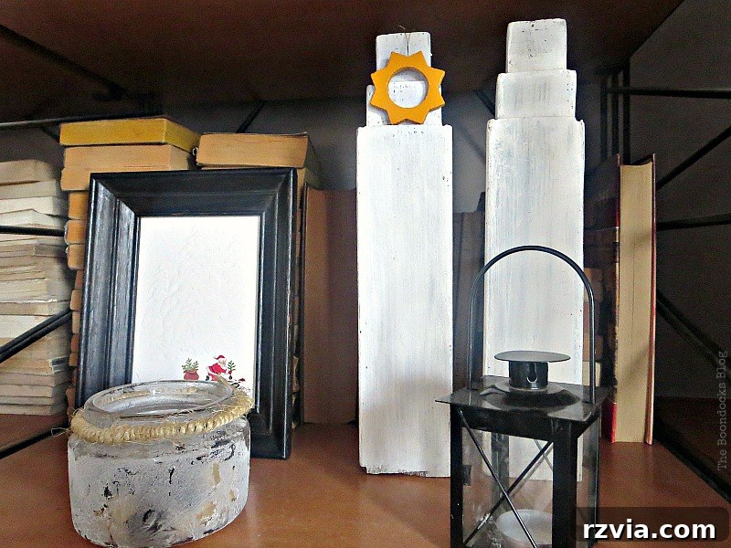 Repurposed wooden legs painted white, now resembling miniature buildings