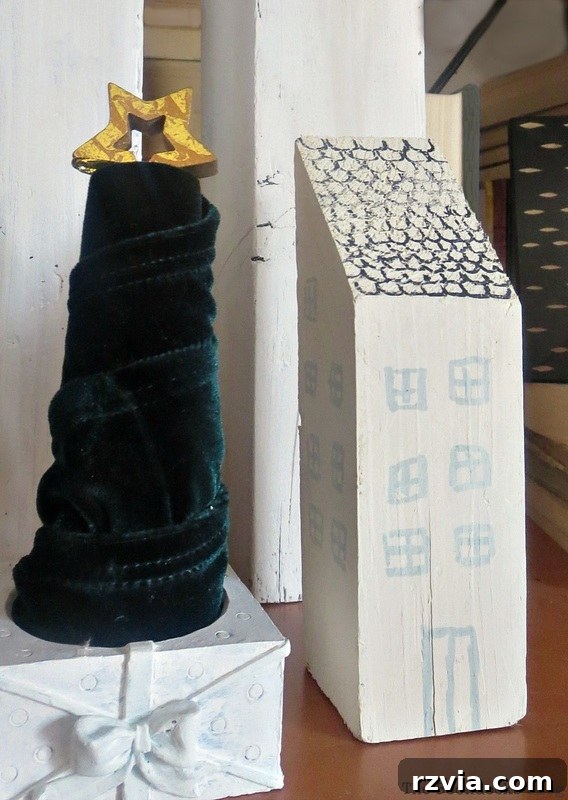 Hand-painted wooden house and a miniature velvet Christmas tree made from a thread spool
