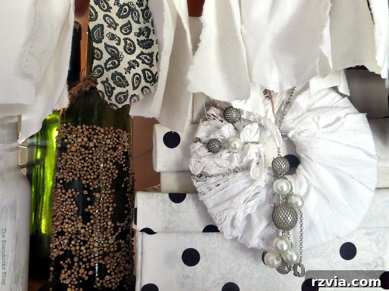 A close-up of handmade Christmas ornaments integrated into the wall unit display