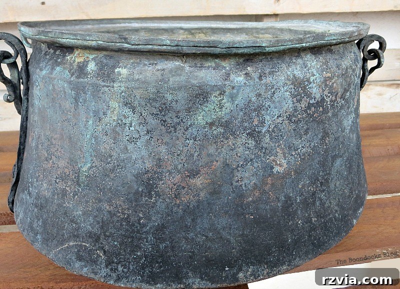 After it was cleaned, A repurposed Antique Cauldron for Christmas theboondocksblog