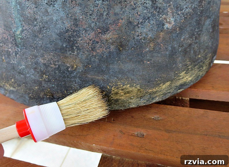 Brushing on the brass, A repurposed Antique Cauldron for Christmas theboondocksblog