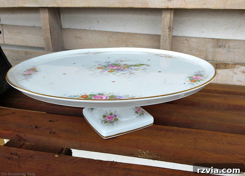 A cake stand, A repurposed Antique Cauldron for Christmas theboondocksblog