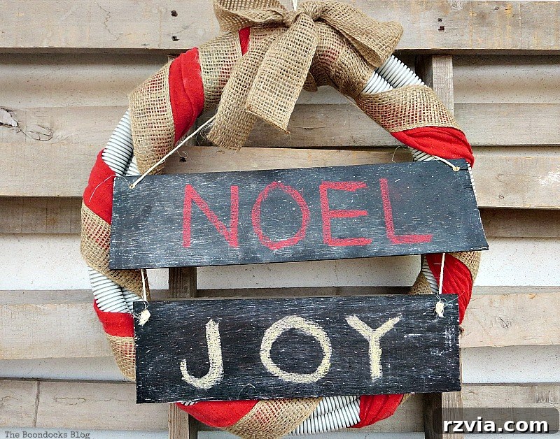 The repurposed tube wreath, originally for Halloween, now beautifully transformed into a Christmas wreath.