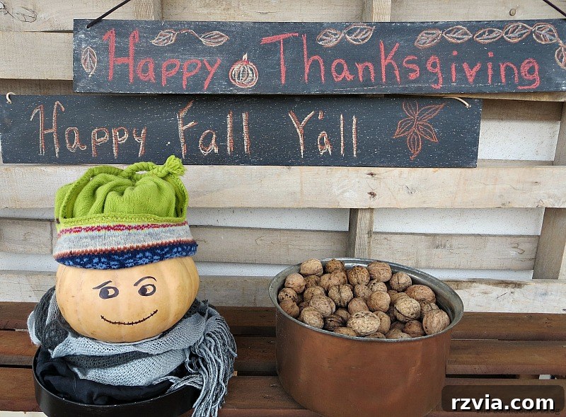 Two finished DIY chalkboard signs with Fall-themed messages, ready for display.