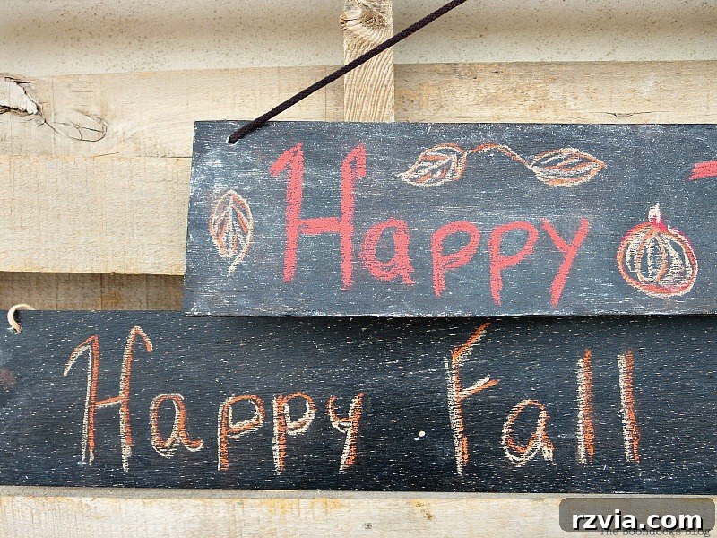 Detailed view of one of the finished Fall chalkboard signs, showcasing the hand-written message and rustic charm.