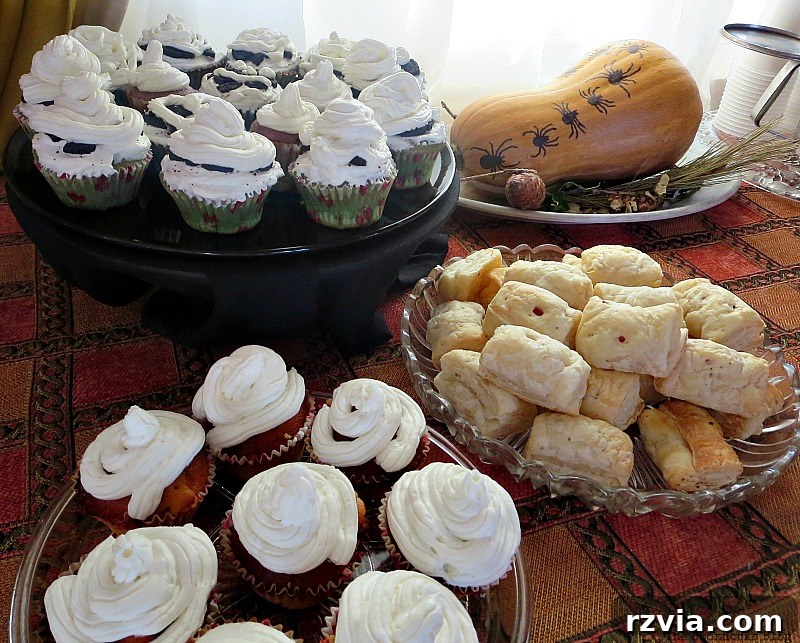 A table laden with an array of tempting snacks, offering a moment of comfort at Paranoid Man's Halloween Party, www.theboondocksblog.com