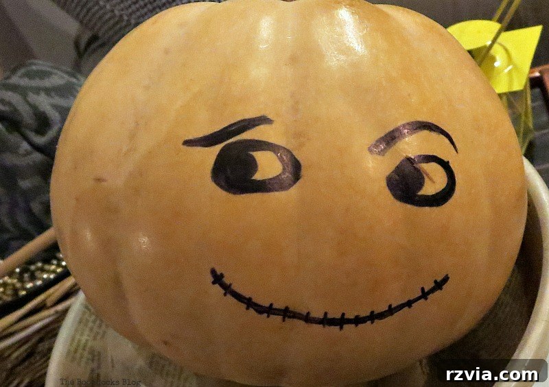 A happy Paranoid Man Pumpkin, looking pleased as he interacts with other party-goers, www.theboondocksblog.com