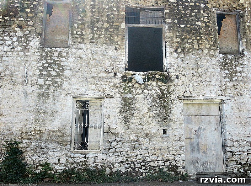 Stone Chronicles of the Shore 12 A decayed building on the waterfront, highlighting its hauntingly beautiful and atmospheric charm, perfect for urban photography. Image by www.theboondocksblog.com