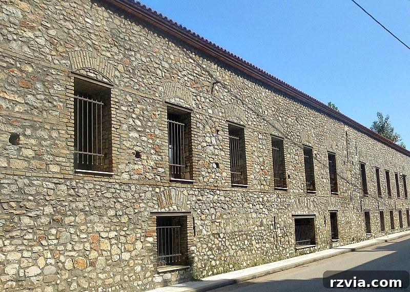 Stone Chronicles of the Shore 14 Restored factory buildings with elegant stone facades, demonstrating successful preservation of historic architecture along the waterfront. Image by www.theboondocksblog.com