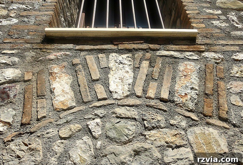 Stone Chronicles of the Shore 15 Close-up detail of expertly laid stones on a factory wall, highlighting the precision and art of historic masonry work. Image by www.theboondocksblog.com