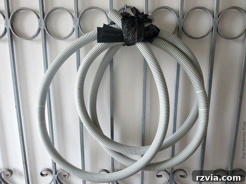 Transform Tubes into a Halloween Wreath 3 An assortment of plastic tubes, showcasing the primary material for creating an upcycled Halloween wreath.