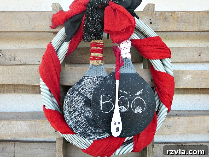Transform Tubes into a Halloween Wreath 9 The unique finished Halloween wreath, crafted from a repurposed tube and adorned with creative elements.
