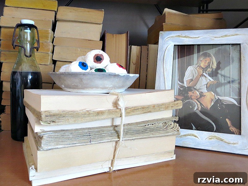 Eyeballs made from walnuts and an image of an evil sister, Halloween Wall Unit Decor.