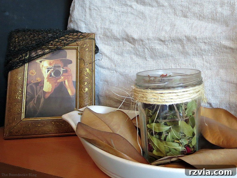Photographer frame, adding a surreal and artistic element to the Halloween Wall Unit Decor.
