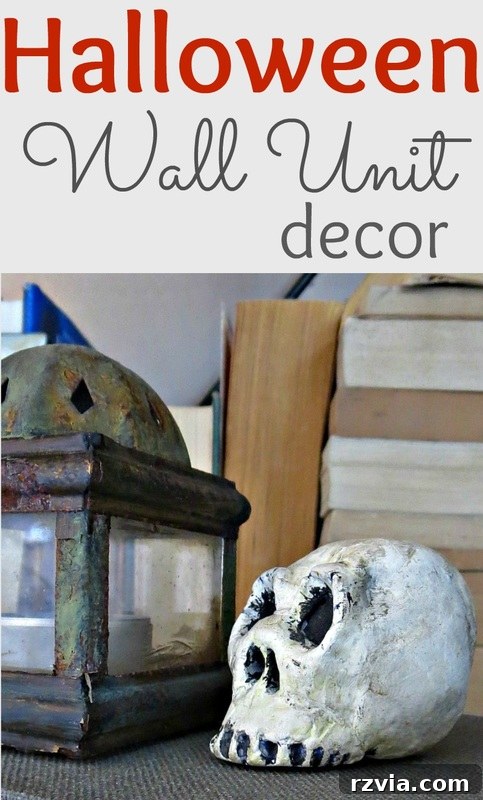 How I decorated my wall unit in preparation for a Halloween party, showcasing the final neutral Halloween decor.