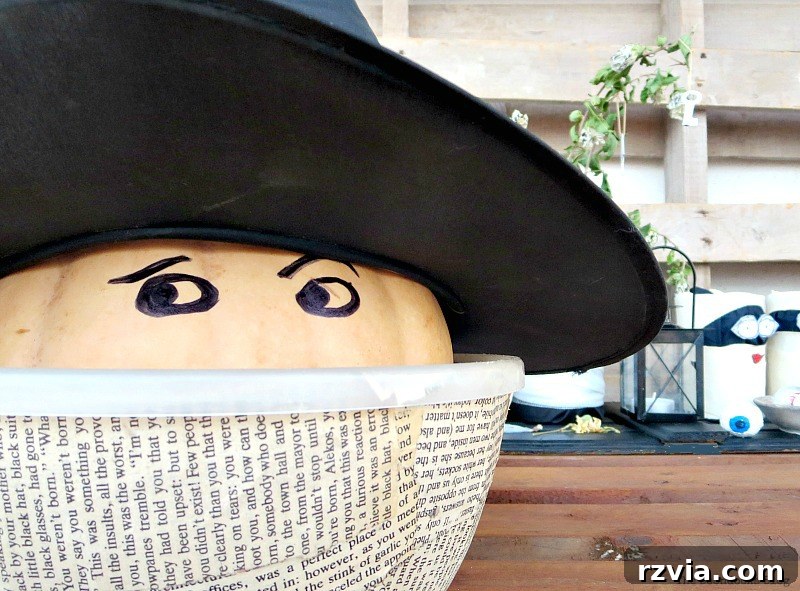 Paranoid Man pumpkin spots the new gang on the Halloween vignette table
