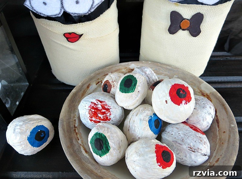 Walnuts painted to resemble eyeballs, creative Halloween craft idea