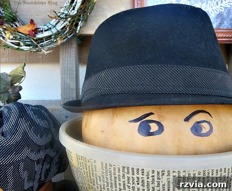 Crafting the Paranoid Pumpkin Man 11 The Paranoid Man Pumpkin wearing a different black hat, contemplating if it will help him stand out, from www.theboondocksblog.com