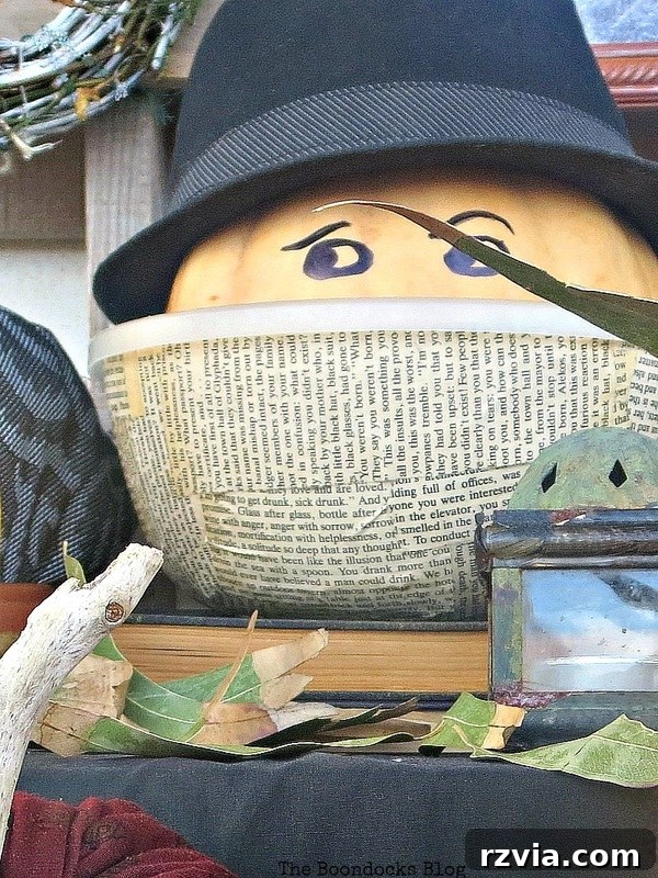 Crafting the Paranoid Pumpkin Man 15 The overall fall vignette featuring 'The Paranoid Man Pumpkin' and various other fall decorations, from www.theboondocksblog.com