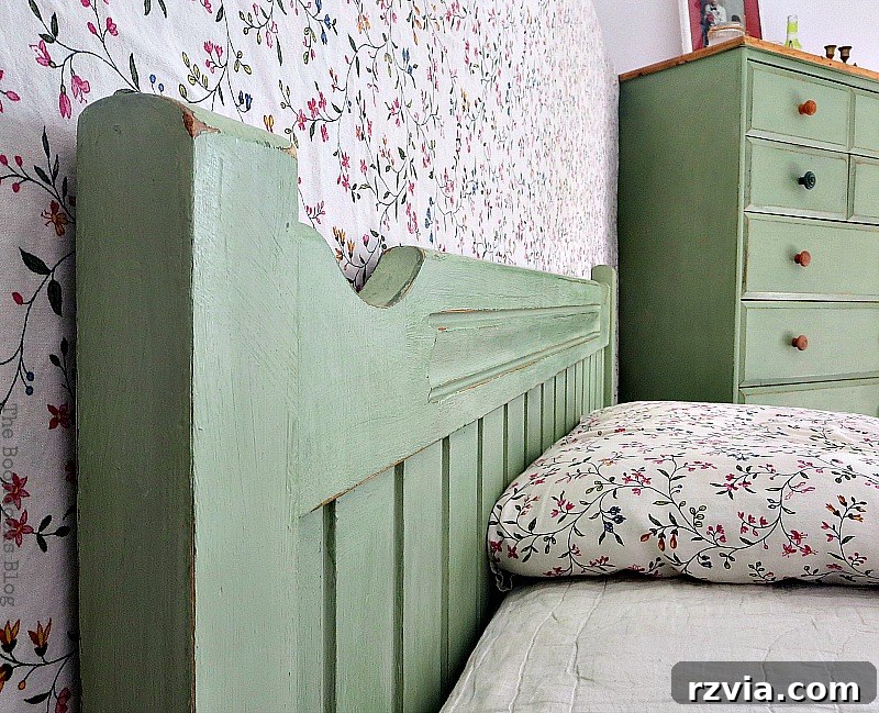 Headboard and dresser in the background, showing how the refurbished pieces blend seamlessly into the bedroom decor.