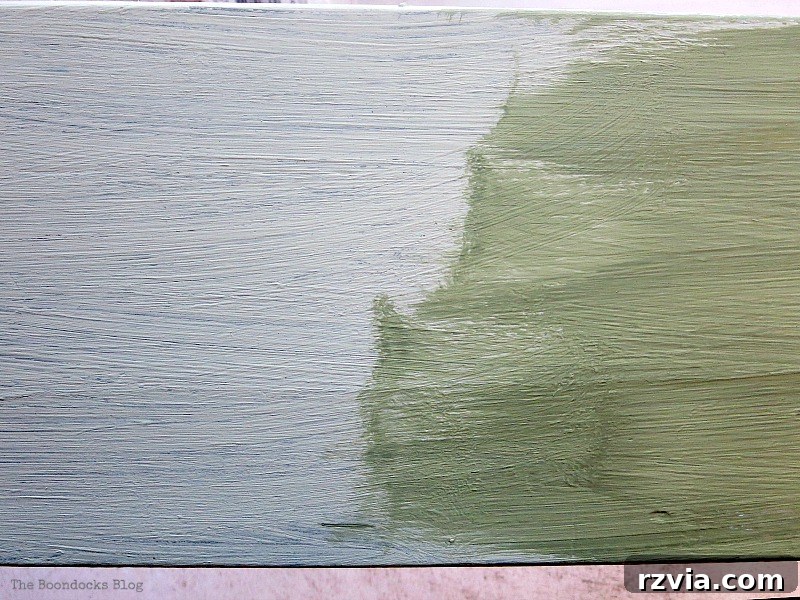 Close-up detail of the different paint layers on the bed frame, highlighting the color depth achieved through mixing and layering.