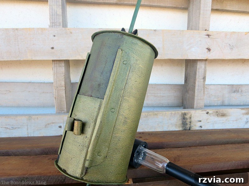 Vintage Coffee Roaster with a solar light placed on top
