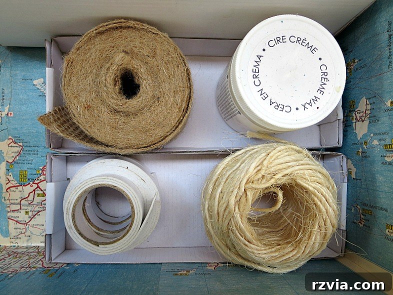 What Stories Does the Vintage Suitcase Tell 11 Close-up of twine and burlap ribbon neatly organized within the vintage suitcase