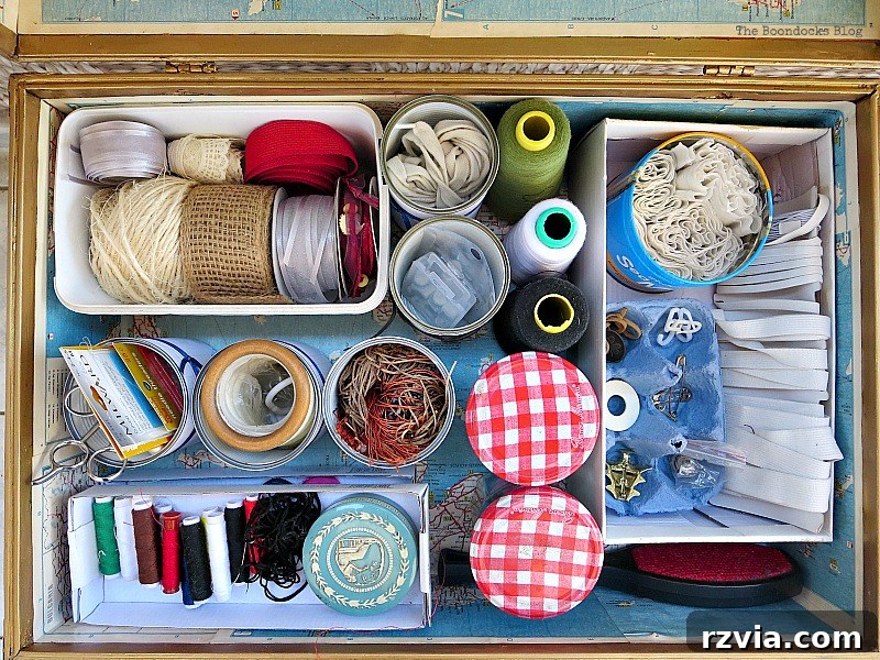 What Stories Does the Vintage Suitcase Tell 13 Vintage suitcase organized with a comprehensive collection of sewing supplies
