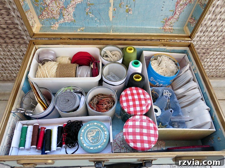 What Stories Does the Vintage Suitcase Tell 14 Abundant sewing supplies neatly arranged and easily accessible within the vintage suitcase