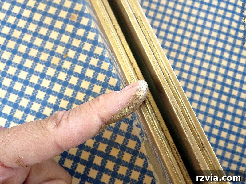 What Stories Does the Vintage Suitcase Tell 6 Applying DecoArt Metallic Lustre with a finger for detailed coverage on vintage suitcase metal