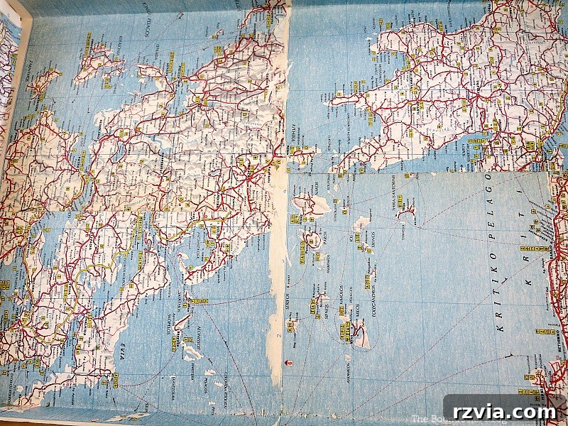 What Stories Does the Vintage Suitcase Tell 9 The top interior of the suitcase featuring artfully torn map edges for an aged vintage look