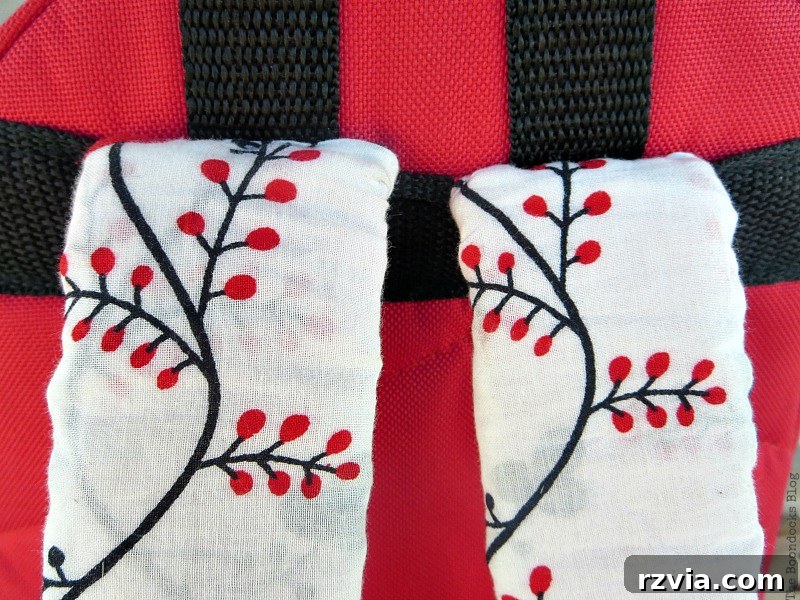From Fabric Scraps to Adventure Packs 17 Detailed shot of the meticulously sewn fabric on the backpack straps.