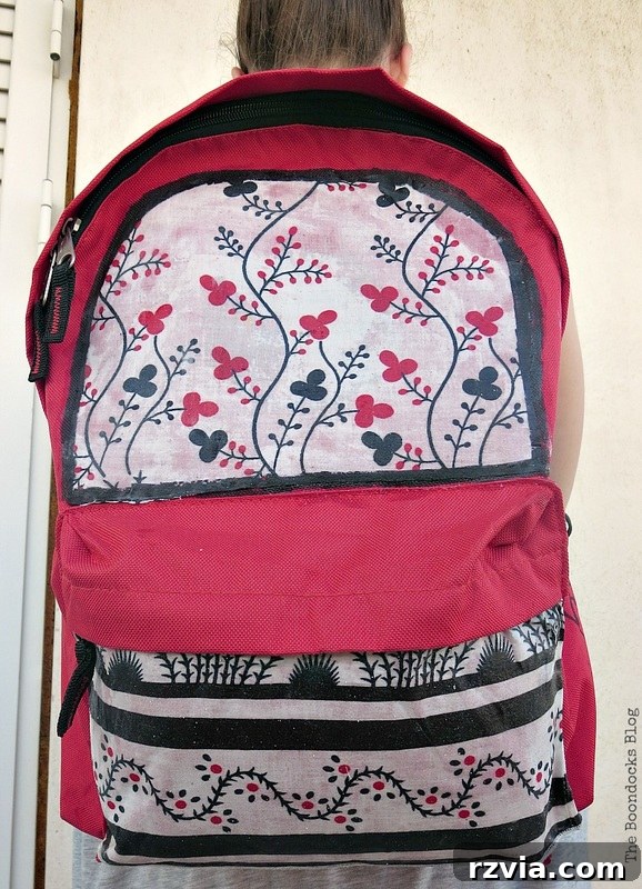 From Fabric Scraps to Adventure Packs 18 The transformed backpack being worn, showing how it looks on the back.