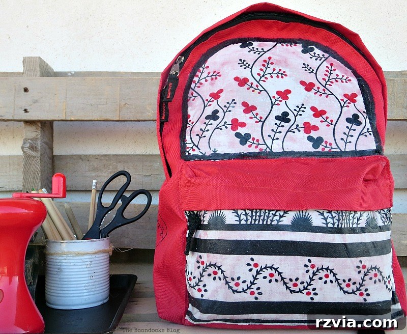 From Fabric Scraps to Adventure Packs 22 The completed madeover backpack, showcasing its new, stylish appearance.
