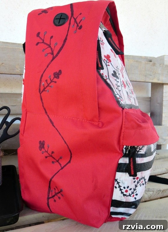 From Fabric Scraps to Adventure Packs 23 Side view of the fully transformed and customized backpack.