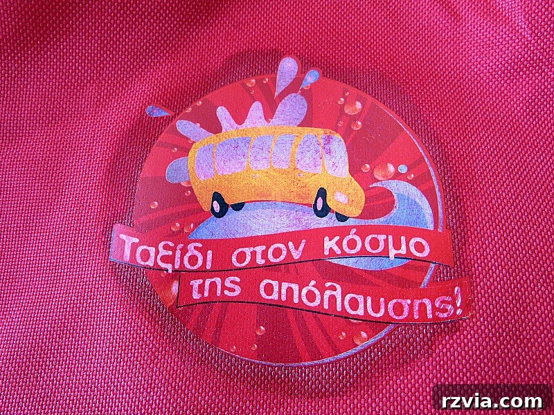 From Fabric Scraps to Adventure Packs 7 Close-up of painting over the sticker, showing the acrylic paint's lack of coverage on the plastic surface.