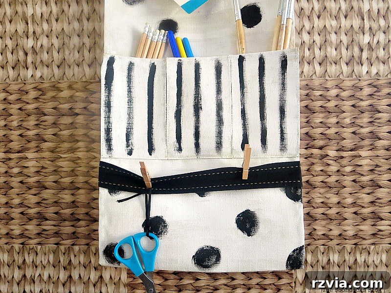 Pockets of the Organizer Holding Pens, Pencils, and Brushes for School Supplies