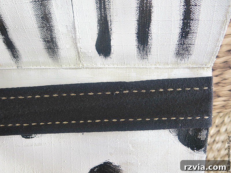 Attaching Black Ribbons to the DIY Hanging Organizer for Functionality