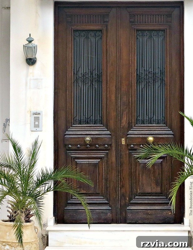 Classic traditional wooden door, exuding timeless elegance and heritage, another beautiful capture from www.theboondocksblog.com's photo essay.