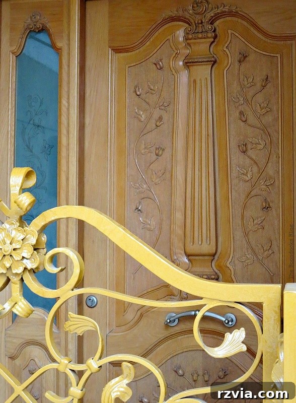 Intricately carved ornate wooden door, displaying exquisite craftsmanship and traditional Greek design elements, captured by www.theboondocksblog.com.