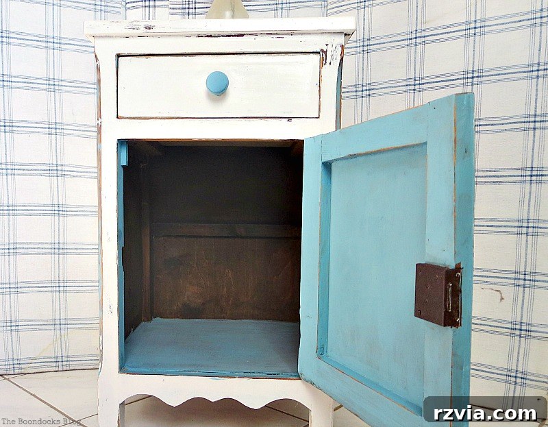 Interior Beauty: The Open Door Reveals a Thoughtfully Painted Inside of the Side Table | www.theboondocksblog.com