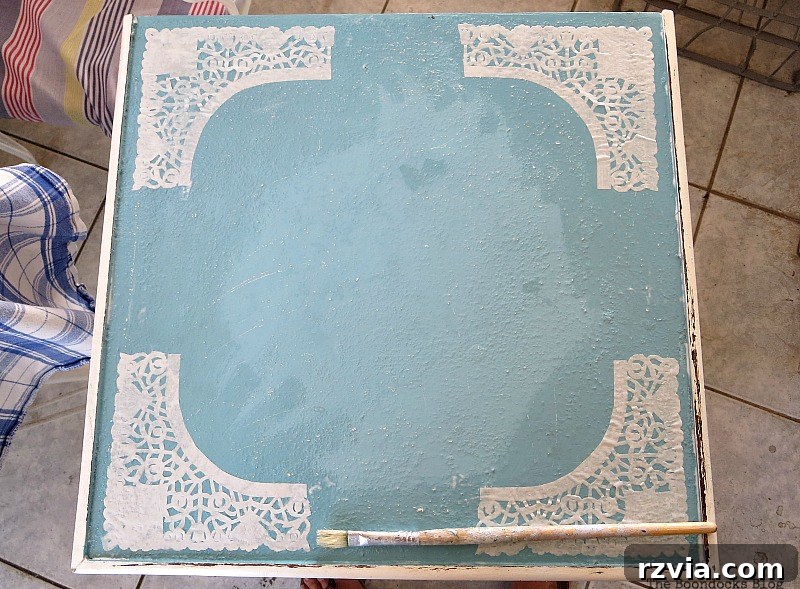 Decoupage in Progress: Delicate Doily Pieces Adhered to the Side Table Top | www.theboondocksblog.com