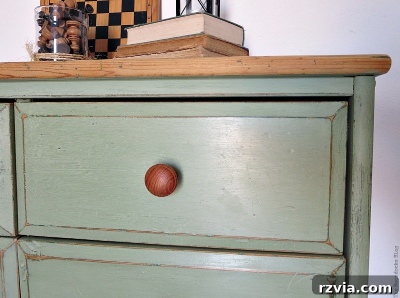 Ikea Pine Dresser Makeover 13 Close up of a corner of the finished green IKEA pine dresser, showing distressed details. How to save an Ikea Pine Dresser www.theboondocksblog.com