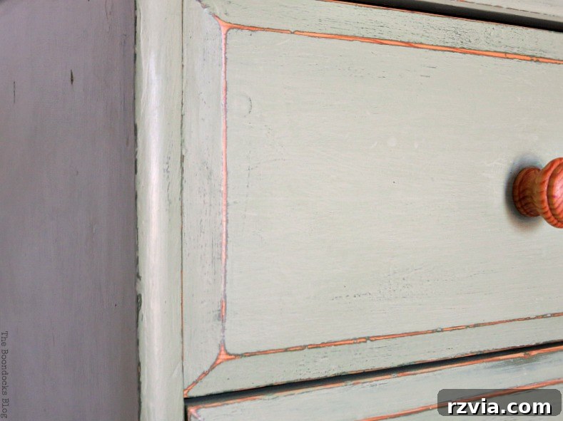 Ikea Pine Dresser Makeover 18 Close up of the side of the dresser, showing how distressing reveals patches of only green paint. How to save an Ikea Pine Dresser www.theboondocksblog.com