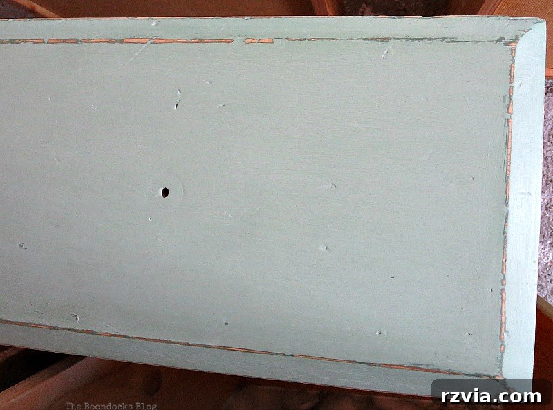 Ikea Pine Dresser Makeover 8 Applying the lighter mixed green paint to the IKEA pine dresser after initial dark green coat. How to save an Ikea Pine Dresser www.theboondocksblog.com