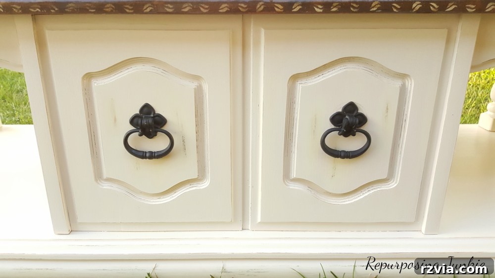 From Curb to Chic: Coffee Table's Gorgeous New Look 6 Attaching the freshly painted hardware to the coffee table, a detailed step in the DIY furniture transformation.