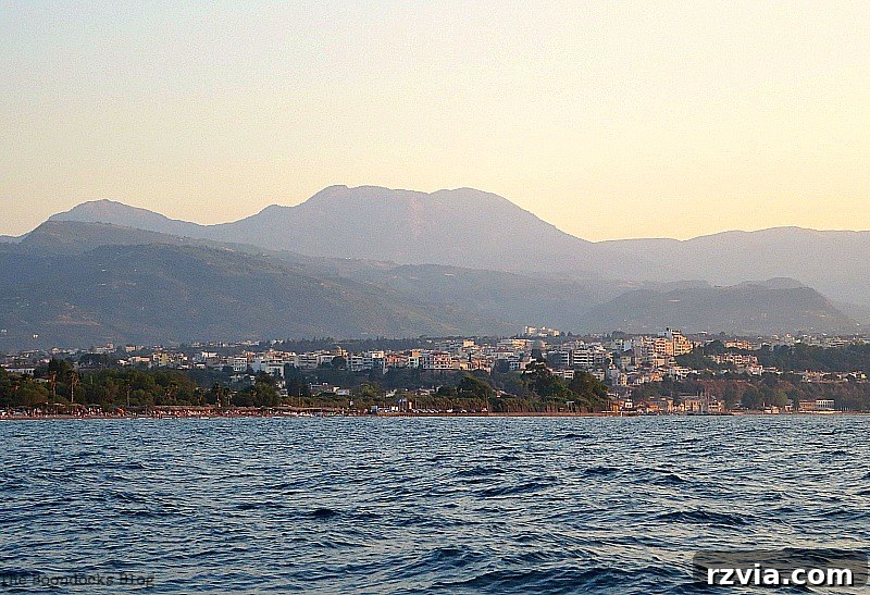 The town bathed in the warm, receding sunlight from afar