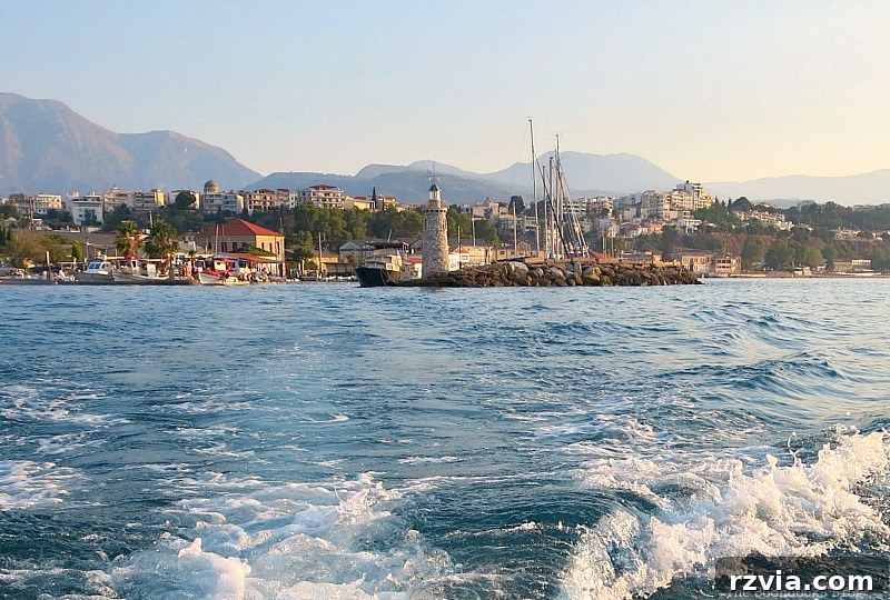 Leaving the Marina with a view of the lighthouse and sailboat masts