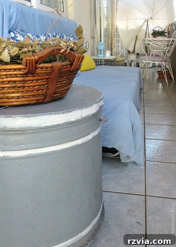 A beautifully revamped olive oil barrel repurposed as a rustic and functional side table on the balcony. Olive Oil Barrel as a Side Table, Part 1 www.theboondocksblog.com