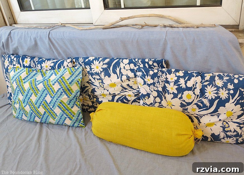 Close-up of soft duvet cover and decorative pillows, enhancing the comfort and style of the balcony daybed. Duvet Cover and Pillows, Part 1 www.theboondocksblog.com